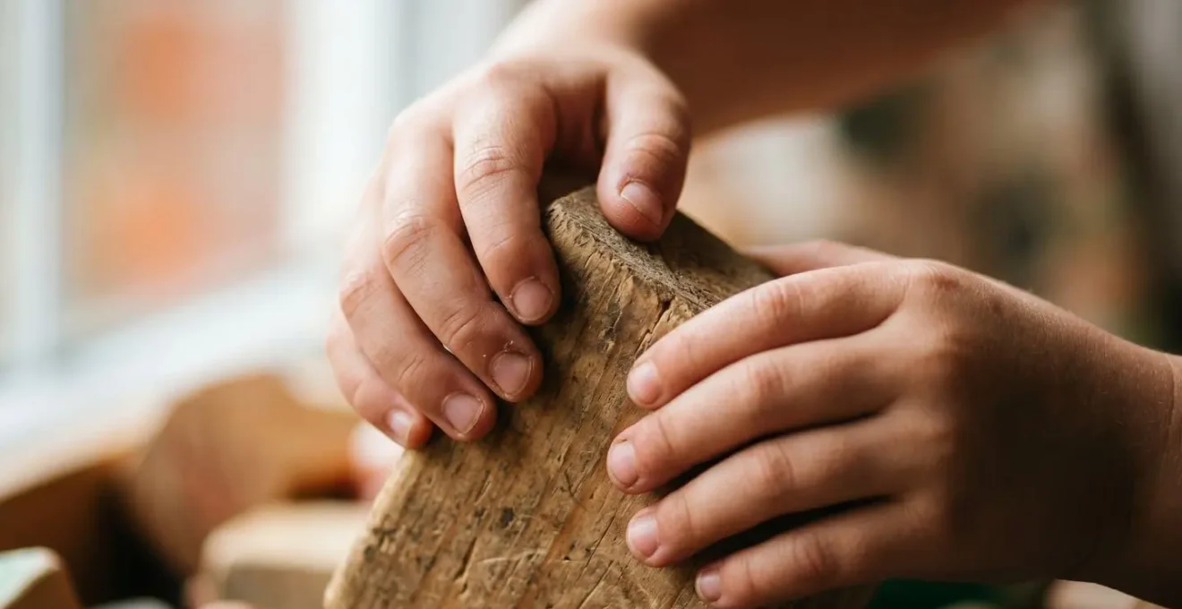 Close-up view of child's hands engaged in proprioceptive heavy work activity