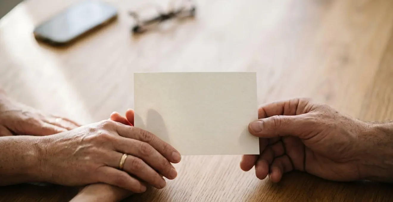 Hands reviewing healthcare documents and financial considerations for medical appointments